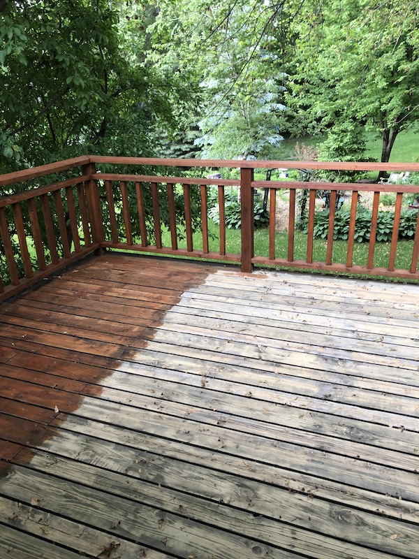 view of left side of deck with stain.