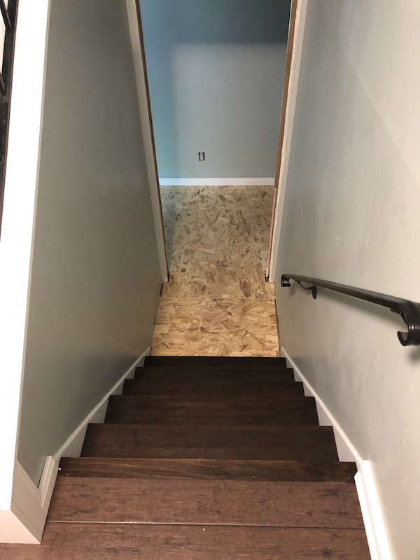 Stairs to the basement are in