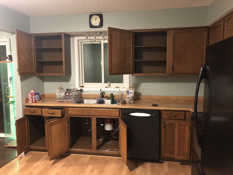 View of empty kitchen sink area.