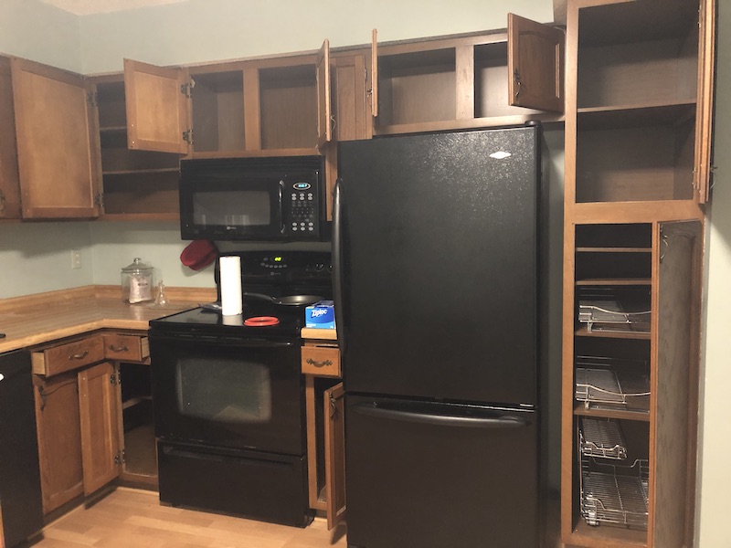 Empty kitchen fridge area.