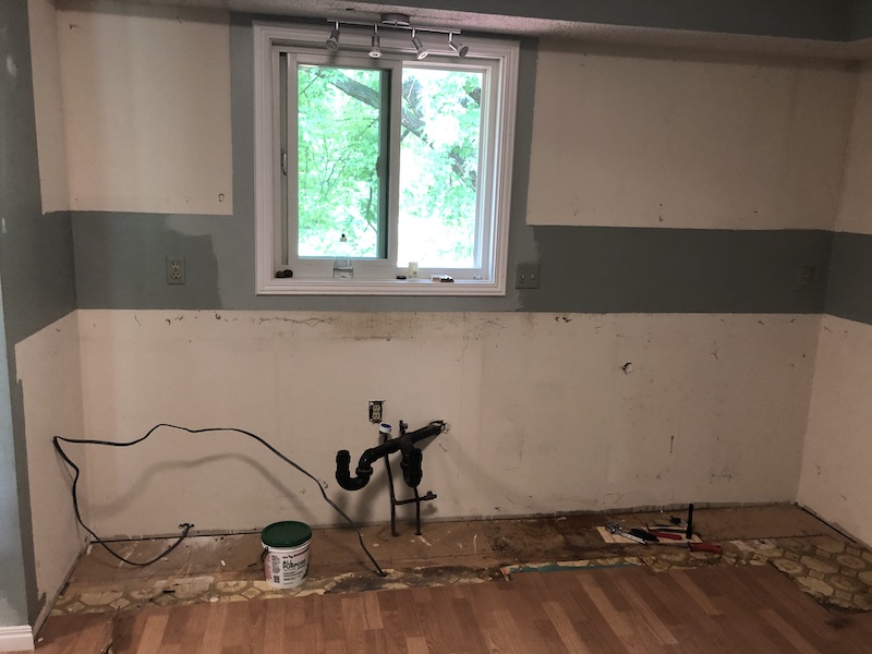 View of gutted kitchen sink area.