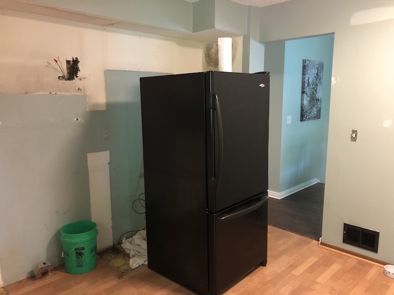 View of gutted fridge sink area.