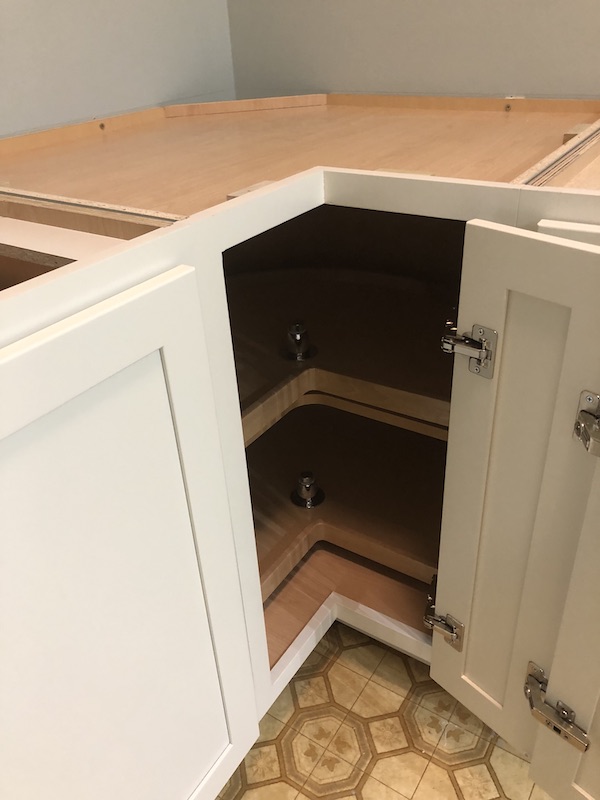 Corner cabinet with lazy susan shelves