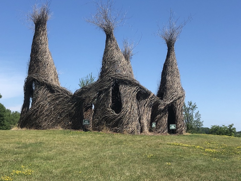 Funky willow branch house-like structure.