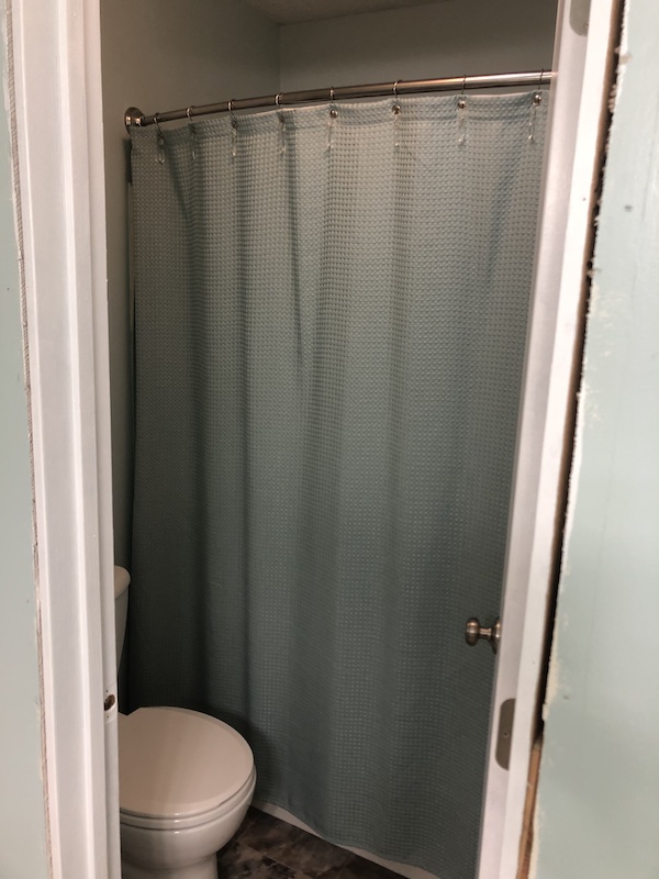 shower curtain with curved rod